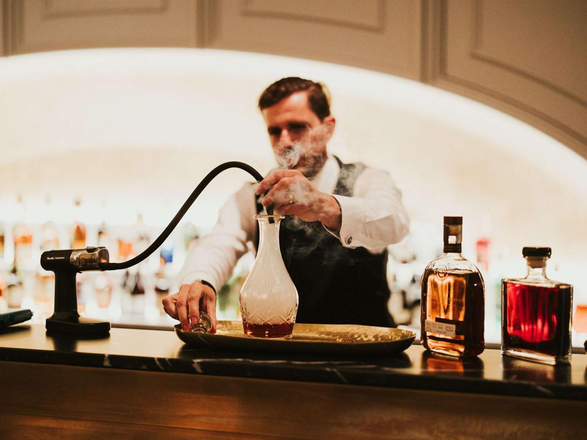 The Playford Adelaide - Mgallery Eksteriør billede A bartender at work
